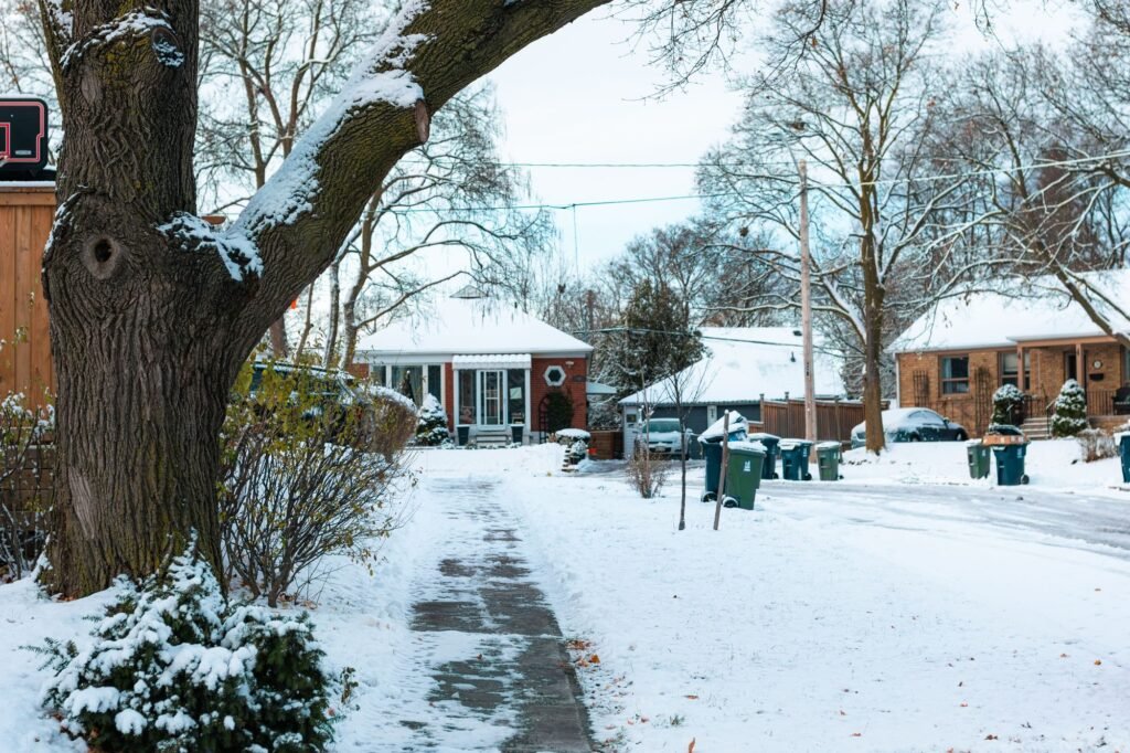 Snow-covered residential street in Buffalo, NY after a storm